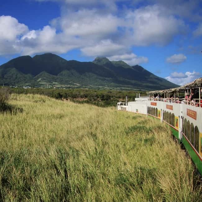 Sugar Train Tour & Drinks|Pick-Up &Drop Off From Cruise Port - Boarding a train built for two kinds of weather
