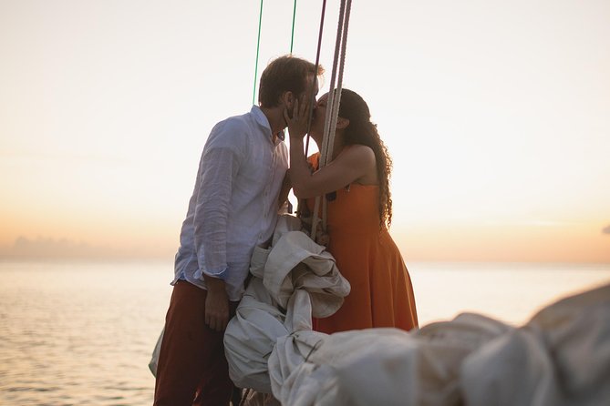 Sunset & Champagne Cruise on a Classic Schooner with boat dogs - The view from the water as the sun drops