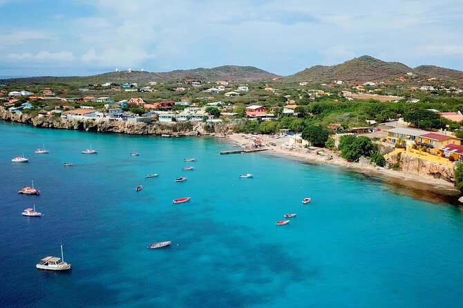 Swim with Turtles at Turtle Bay, Curacao: Boat, Blue Room Cave - The Blue Room Cave demands good judgment