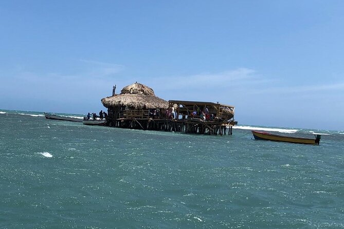 Tour to Black River and YS Falls - Taking the short boat ride to Floyd’s Pelican Bar